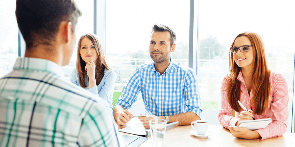 Hiring managers interviewing a candidate with help of in house recruiter