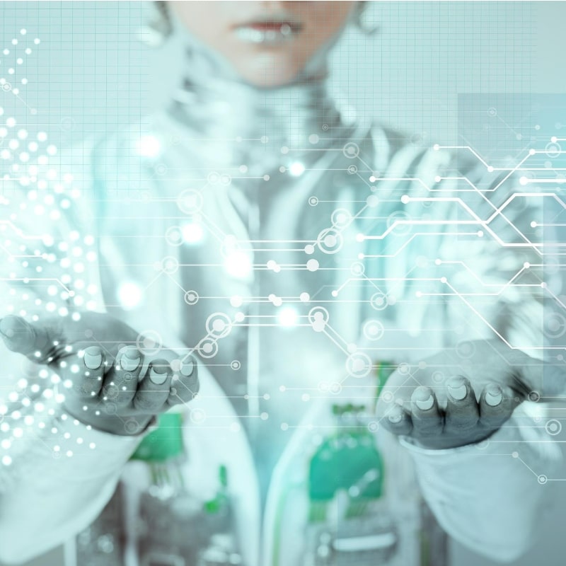 a sci-fi looking woman holding her hands out as if she has data in her hands