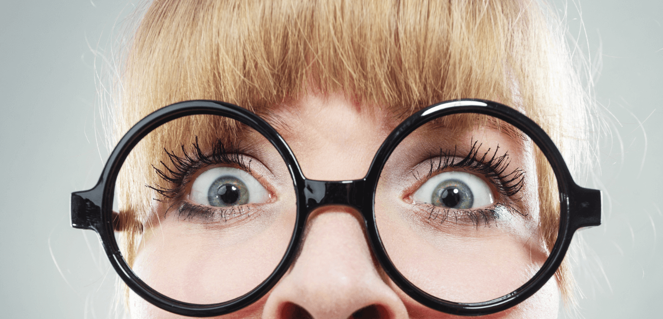 Extreme close up lady looking scared by competency-based interview questions