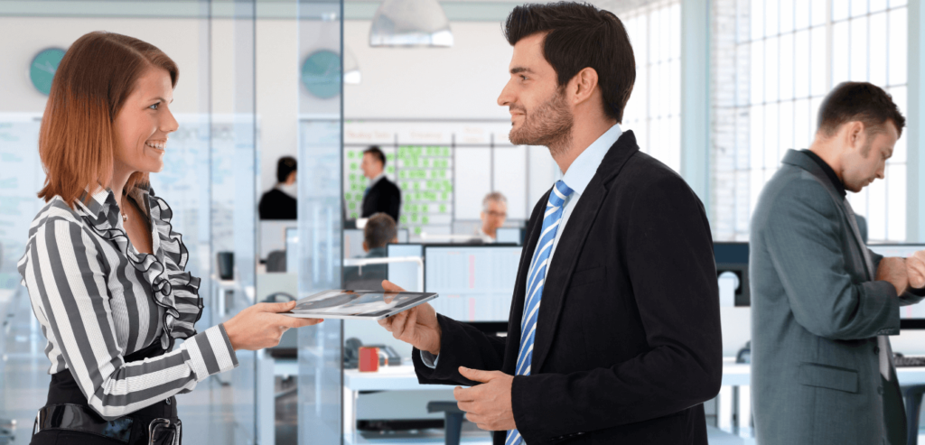 Workers in formal office attire in a corporate environment