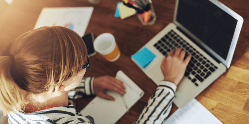 Lady researching the company she is interviewing for