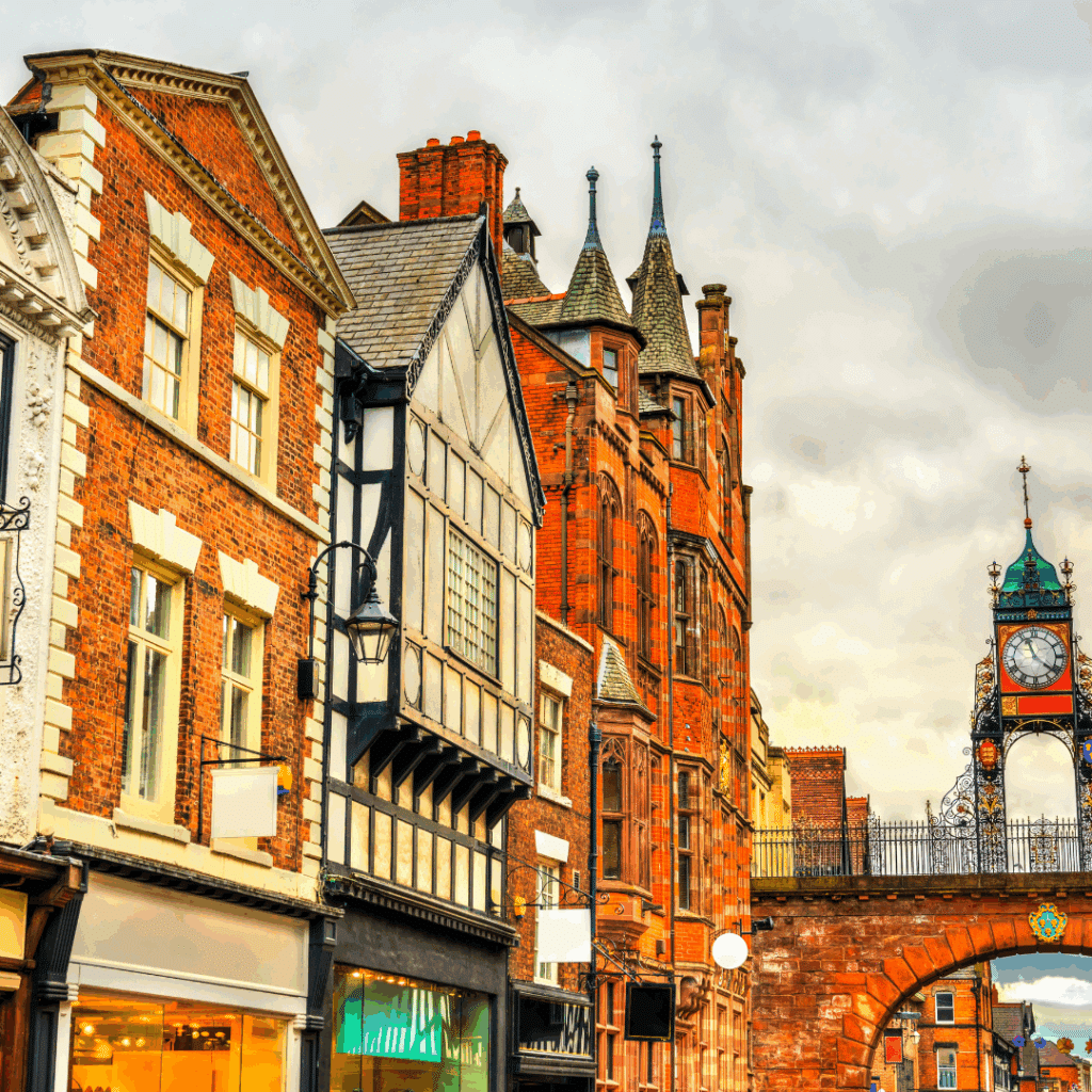 Colourful mix of historic buildings and the Eastgate Clock archway in Chester’s city centre.