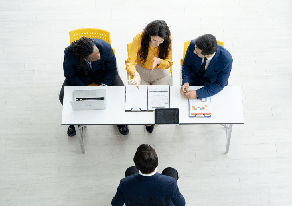 Job interview panel meeting with candidate in office